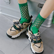 pink fishnet socks